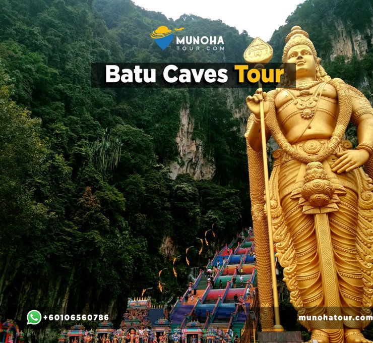 Batu Caves Private Tour, Visitors exploring the iconic during a private tour from Kuala Lumpur Malaysia, with the towering golden statue of Lord Murugan in the background.