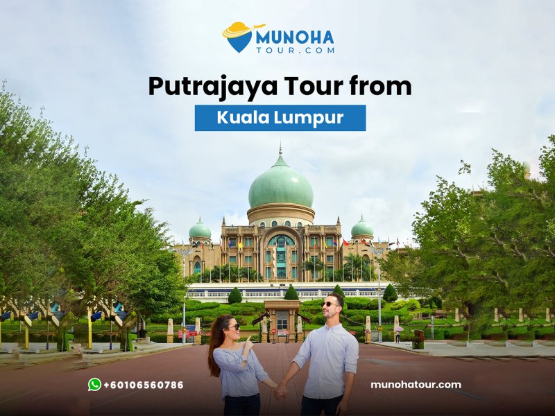 Putrajaya Tour from Kuala Lumpur. Tourist enjoying the view of Dataran Putra in Putrajaya, right next to the prime minister office.v